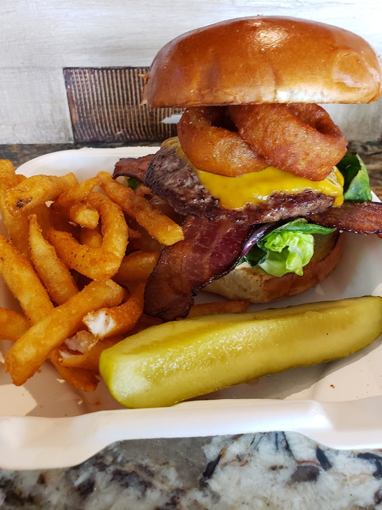 close up of a burger and fries